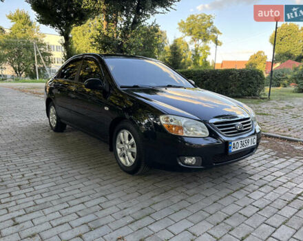 Черный Киа Черато, объемом двигателя 1.98 л и пробегом 265 тыс. км за 5900 $, фото 1 на Automoto.ua