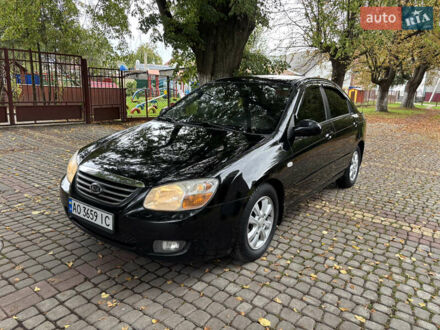 Чорний Кіа Черато, об'ємом двигуна 1.98 л та пробігом 265 тис. км за 5450 $, фото 1 на Automoto.ua