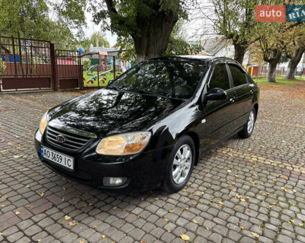 Черный Киа Черато, объемом двигателя 1.98 л и пробегом 265 тыс. км за 5450 $, фото 1 на Automoto.ua