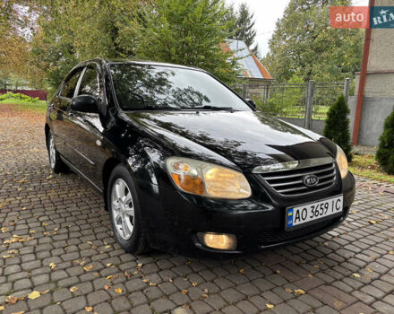 Черный Киа Черато, объемом двигателя 1.98 л и пробегом 264 тыс. км за 5800 $, фото 1 на Automoto.ua