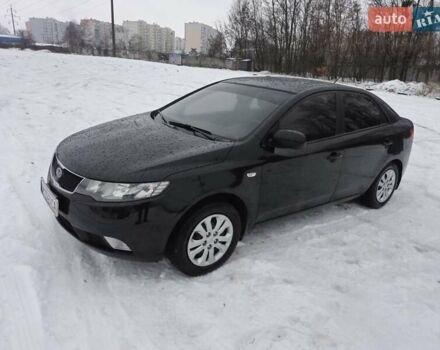 Черный Киа Черато, объемом двигателя 1.6 л и пробегом 180 тыс. км за 6700 $, фото 1 на Automoto.ua
