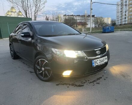 Черный Киа Черато, объемом двигателя 2 л и пробегом 187 тыс. км за 4300 $, фото 1 на Automoto.ua