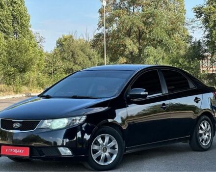 Черный Киа Черато, объемом двигателя 2 л и пробегом 170 тыс. км за 5700 $, фото 1 на Automoto.ua