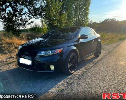 Черный Киа Черато, объемом двигателя 2 л и пробегом 238 тыс. км за 7400 $, фото 1 на Automoto.ua