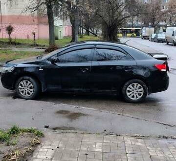 Чорний Кіа Черато, об'ємом двигуна 1.59 л та пробігом 186 тис. км за 8000 $, фото 1 на Automoto.ua