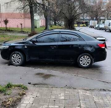 Черный Киа Черато, объемом двигателя 1.59 л и пробегом 186 тыс. км за 8000 $, фото 1 на Automoto.ua