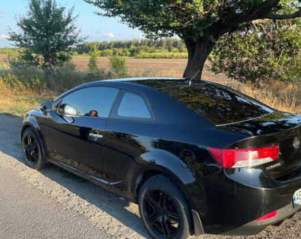 Чорний Кіа Черато, об'ємом двигуна 2 л та пробігом 238 тис. км за 7700 $, фото 1 на Automoto.ua