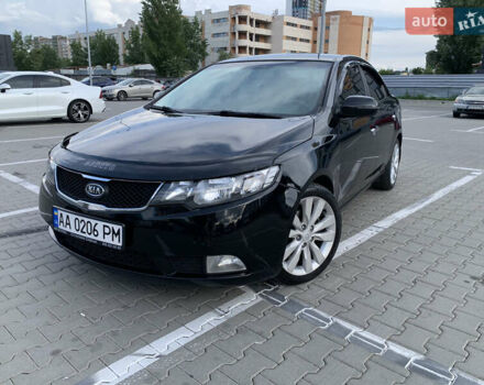 Чорний Кіа Черато, об'ємом двигуна 2 л та пробігом 175 тис. км за 9800 $, фото 1 на Automoto.ua