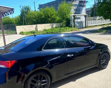 Чорний Кіа Черато, об'ємом двигуна 2 л та пробігом 99 тис. км за 7500 $, фото 1 на Automoto.ua