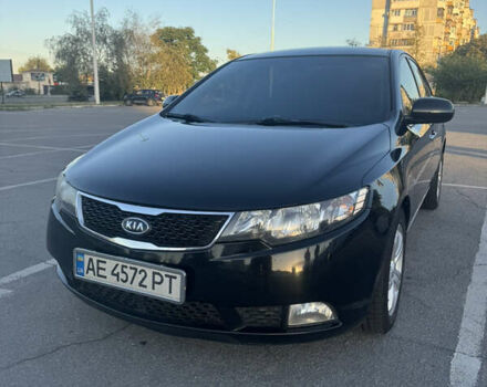 Чорний Кіа Черато, об'ємом двигуна 2 л та пробігом 183 тис. км за 8299 $, фото 1 на Automoto.ua