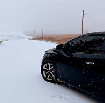 Черный Киа Черато, объемом двигателя 2 л и пробегом 252 тыс. км за 8300 $, фото 1 на Automoto.ua