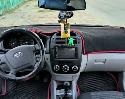 Фиолетовый Киа Черато, объемом двигателя 1.58 л и пробегом 170 тыс. км за 5700 $, фото 8 на Automoto.ua