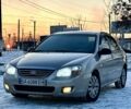 Коричневый Киа Черато, объемом двигателя 1.6 л и пробегом 220 тыс. км за 3950 $, фото 1 на Automoto.ua