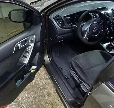 Коричневый Киа Черато, объемом двигателя 2 л и пробегом 250 тыс. км за 7200 $, фото 3 на Automoto.ua