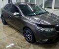 Коричневый Киа Черато, объемом двигателя 2 л и пробегом 250 тыс. км за 7200 $, фото 1 на Automoto.ua