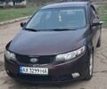 Коричневый Киа Черато, объемом двигателя 2 л и пробегом 217 тыс. км за 7000 $, фото 1 на Automoto.ua