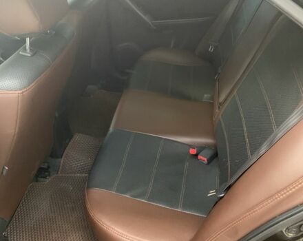 Коричневый Киа Черато, объемом двигателя 1.6 л и пробегом 270 тыс. км за 7500 $, фото 6 на Automoto.ua