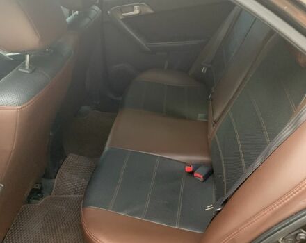 Коричневый Киа Черато, объемом двигателя 1.6 л и пробегом 270 тыс. км за 7500 $, фото 5 на Automoto.ua