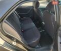Коричневий Кіа Черато, об'ємом двигуна 1.6 л та пробігом 110 тис. км за 4750 $, фото 14 на Automoto.ua