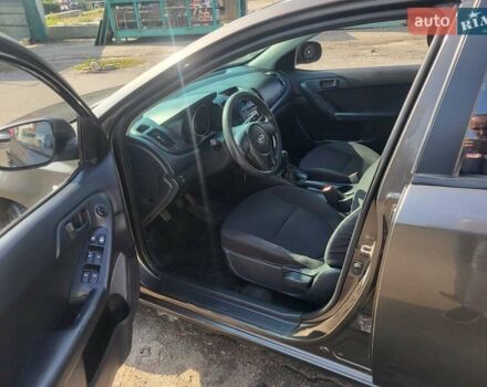 Коричневий Кіа Черато, об'ємом двигуна 1.6 л та пробігом 110 тис. км за 4750 $, фото 8 на Automoto.ua