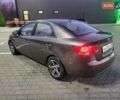 Коричневый Киа Черато, объемом двигателя 1.6 л и пробегом 110 тыс. км за 5600 $, фото 6 на Automoto.ua
