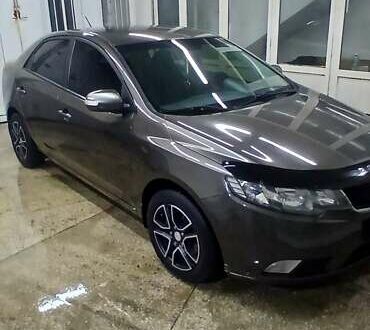 Коричневый Киа Черато, объемом двигателя 2 л и пробегом 250 тыс. км за 7200 $, фото 1 на Automoto.ua