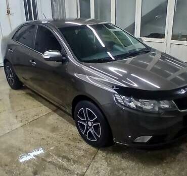 Коричневий Кіа Черато, об'ємом двигуна 2 л та пробігом 250 тис. км за 7200 $, фото 1 на Automoto.ua