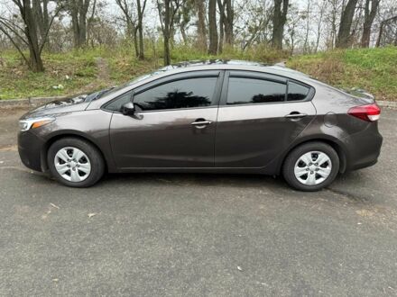 Коричневый Киа Черато, объемом двигателя 2 л и пробегом 107 тыс. км за 11000 $, фото 1 на Automoto.ua