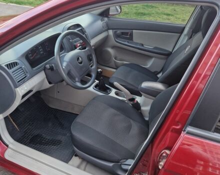 Красный Киа Черато, объемом двигателя 1.6 л и пробегом 260 тыс. км за 3650 $, фото 5 на Automoto.ua