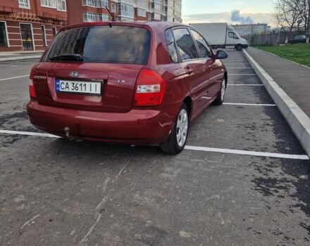 Красный Киа Черато, объемом двигателя 1.6 л и пробегом 260 тыс. км за 3650 $, фото 1 на Automoto.ua