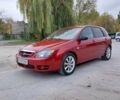 Червоний Кіа Черато, об'ємом двигуна 1.6 л та пробігом 120 тис. км за 4300 $, фото 1 на Automoto.ua