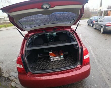 Красный Киа Черато, объемом двигателя 1.6 л и пробегом 230 тыс. км за 4400 $, фото 12 на Automoto.ua