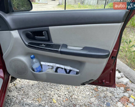 Червоний Кіа Черато, об'ємом двигуна 1.6 л та пробігом 340 тис. км за 2500 $, фото 16 на Automoto.ua