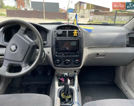 Червоний Кіа Черато, об'ємом двигуна 1.6 л та пробігом 340 тис. км за 2500 $, фото 15 на Automoto.ua