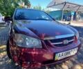 Червоний Кіа Черато, об'ємом двигуна 1.6 л та пробігом 234 тис. км за 2500 $, фото 1 на Automoto.ua