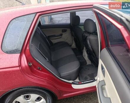 Червоний Кіа Черато, об'ємом двигуна 1.59 л та пробігом 230 тис. км за 4400 $, фото 1 на Automoto.ua