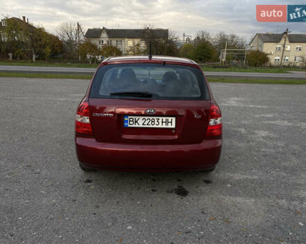Киа Черато 2006 в Дубно на Automoto.ua Красный Киа Черато, объемом двигателя 1.6 л и пробегом 211 тыс. км за 4000 $, фото 3 на Automoto.ua