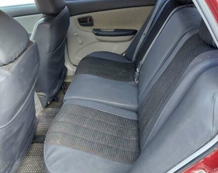 Червоний Кіа Черато, об'ємом двигуна 1.6 л та пробігом 120 тис. км за 4300 $, фото 10 на Automoto.ua