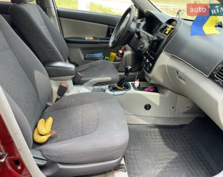 Червоний Кіа Черато, об'ємом двигуна 1.6 л та пробігом 340 тис. км за 2500 $, фото 13 на Automoto.ua