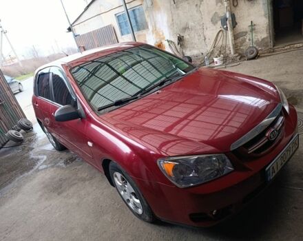 Красный Киа Черато, объемом двигателя 1.6 л и пробегом 230 тыс. км за 4400 $, фото 6 на Automoto.ua