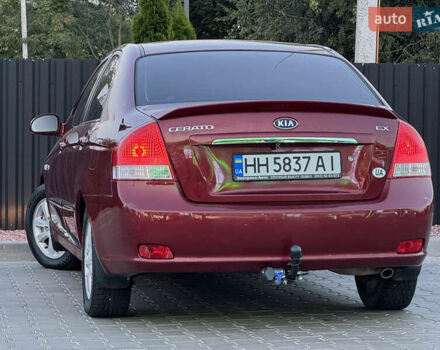 Красный Киа Черато, объемом двигателя 1.98 л и пробегом 180 тыс. км за 5600 $, фото 15 на Automoto.ua