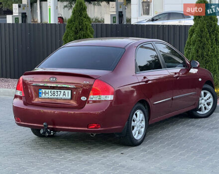 Красный Киа Черато, объемом двигателя 1.98 л и пробегом 180 тыс. км за 5600 $, фото 17 на Automoto.ua
