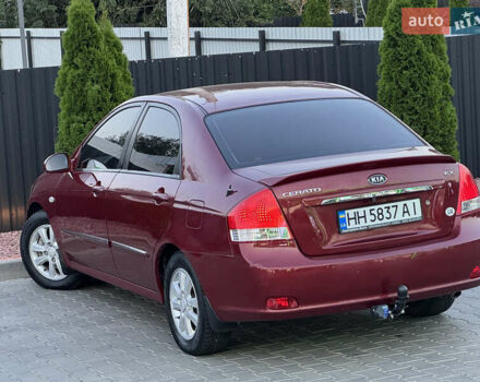 Красный Киа Черато, объемом двигателя 1.98 л и пробегом 180 тыс. км за 5600 $, фото 14 на Automoto.ua