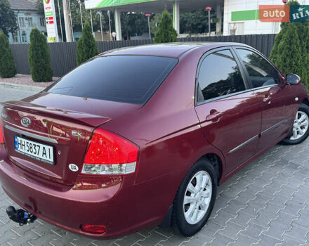 Красный Киа Черато, объемом двигателя 1.98 л и пробегом 180 тыс. км за 5600 $, фото 19 на Automoto.ua