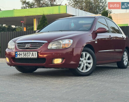 Красный Киа Черато, объемом двигателя 1.98 л и пробегом 180 тыс. км за 5600 $, фото 2 на Automoto.ua