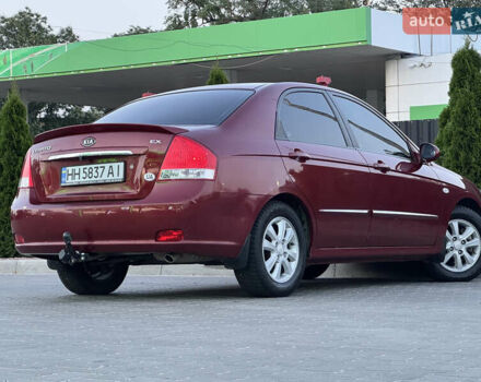 Красный Киа Черато, объемом двигателя 1.98 л и пробегом 180 тыс. км за 5600 $, фото 16 на Automoto.ua