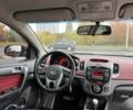 Красный Киа Черато, объемом двигателя 2 л и пробегом 250 тыс. км за 4800 $, фото 4 на Automoto.ua