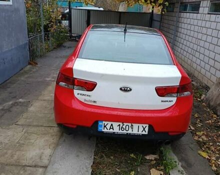 Червоний Кіа Черато, об'ємом двигуна 2 л та пробігом 177 тис. км за 4500 $, фото 2 на Automoto.ua