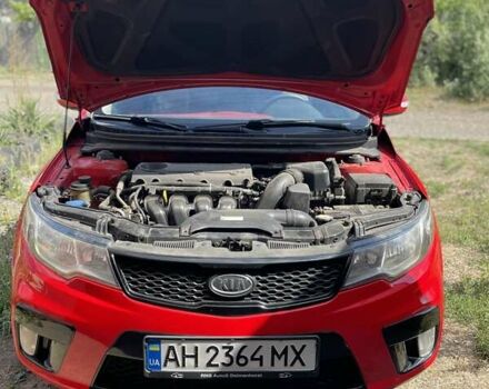 Червоний Кіа Черато, об'ємом двигуна 2 л та пробігом 165 тис. км за 8000 $, фото 11 на Automoto.ua