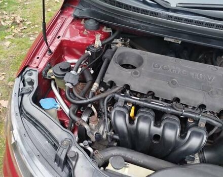Червоний Кіа Черато, об'ємом двигуна 2 л та пробігом 345 тис. км за 6800 $, фото 9 на Automoto.ua